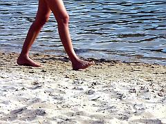 Urlaubsfoto: Beine am Strand